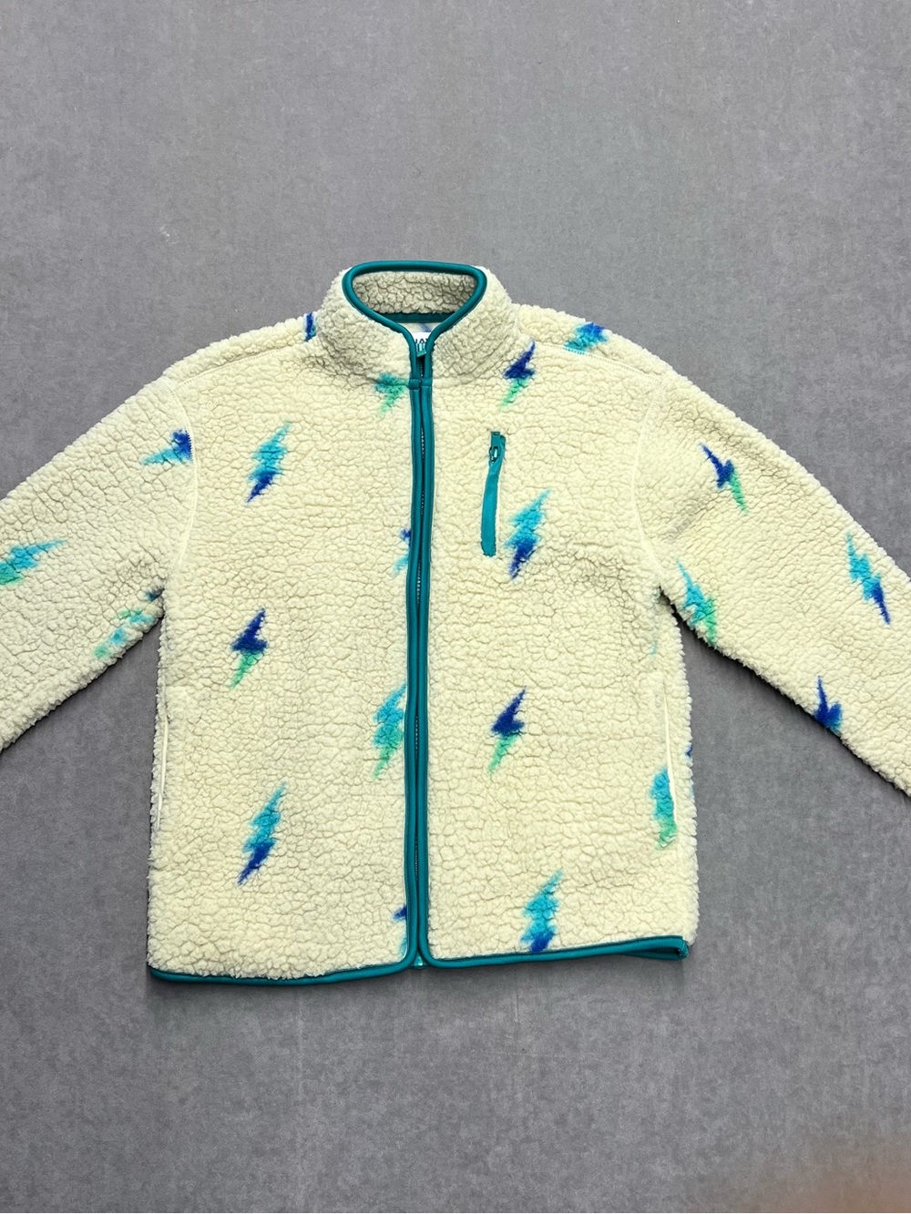 Old Navy Cream Sherpa Jacket with Blue & Teal Lightning Bolts